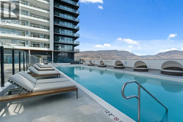 Modern 1 Bed  + Den Converted Bedroom Condo in Luxury Resort Style Apartment
